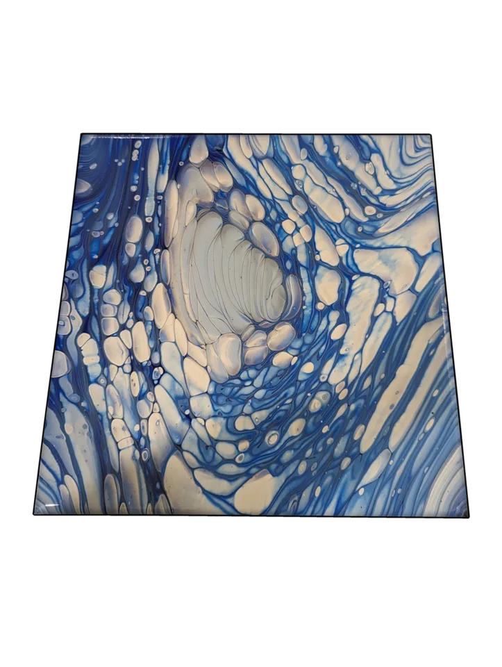 Square blue and cream cellular pour curling around a pale center.