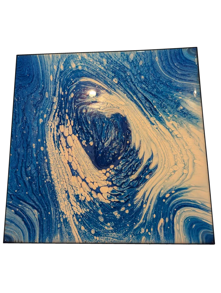 Square blue and cream pour with a deep curling center and fine cells.