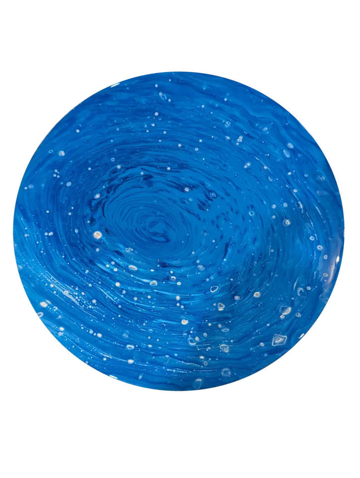 Round vivid blue monochromatic piece with concentric motion and scattered pale dots.