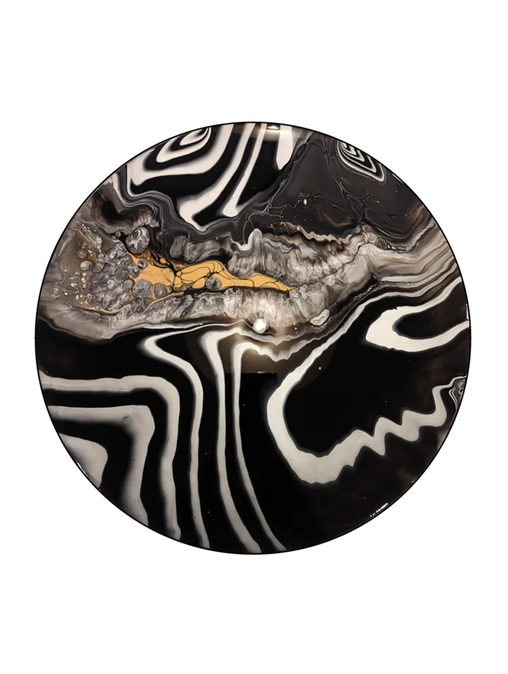 Round black, white, gray and gold painting with bold striped geode forms.
